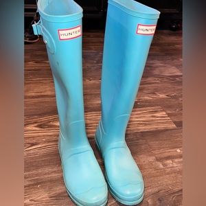 Hunter rain boots.